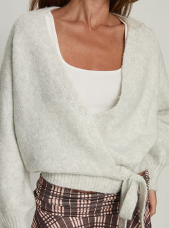 back view of model wearing Princess Polly Daelan Wrap Knit Cardigan Grey Marle cropped 