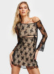 Mini dress Cold shoulder style, mesh floral material, sheer long sleeves, cut out at under bust with tie fastening, lettuce trim edge Good stretch, lined body 