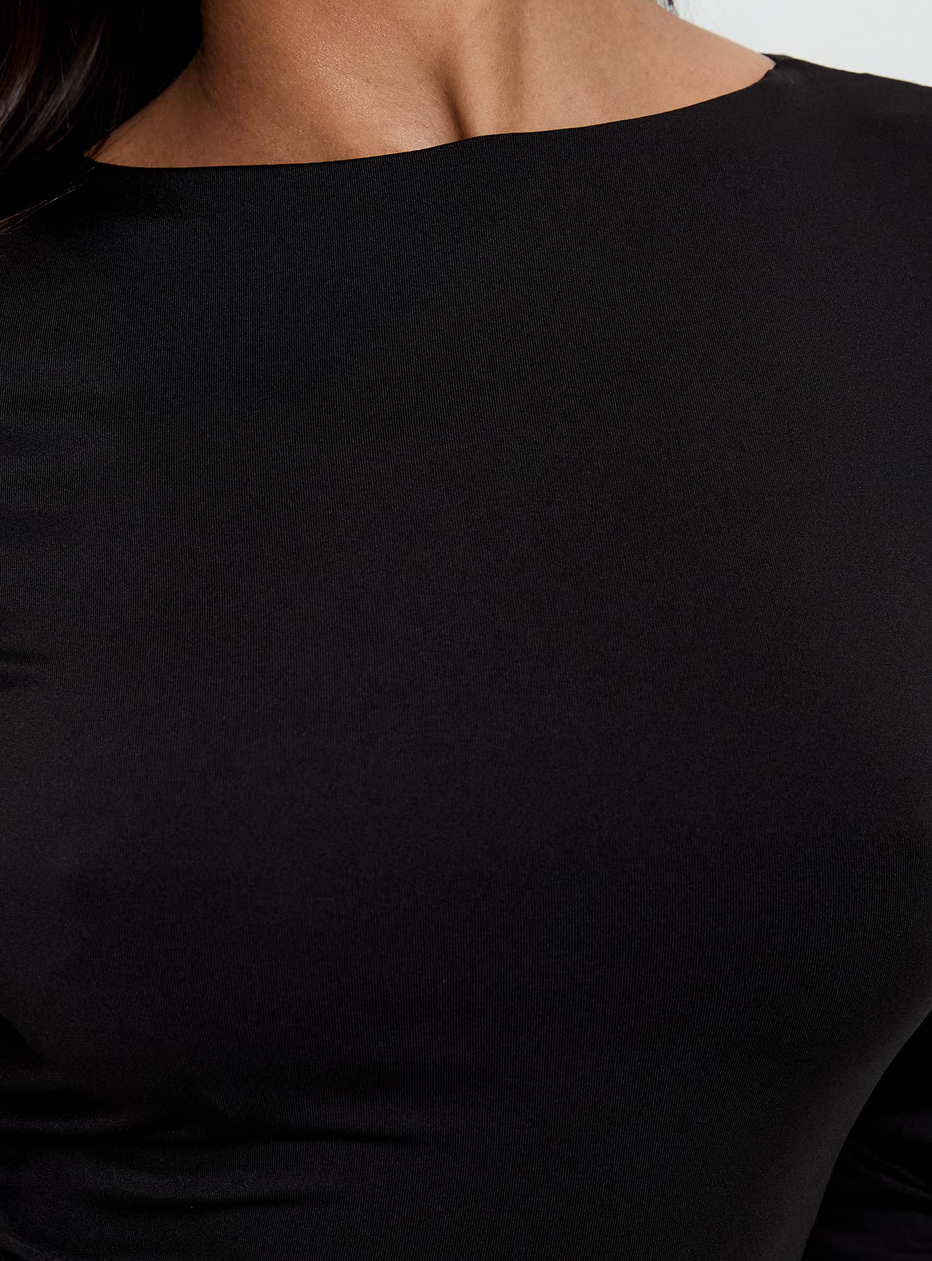 side view of model wearing Princess Polly Lifes Good Long Sleeve Backless Top Black Full Sleeves Crew Neck 