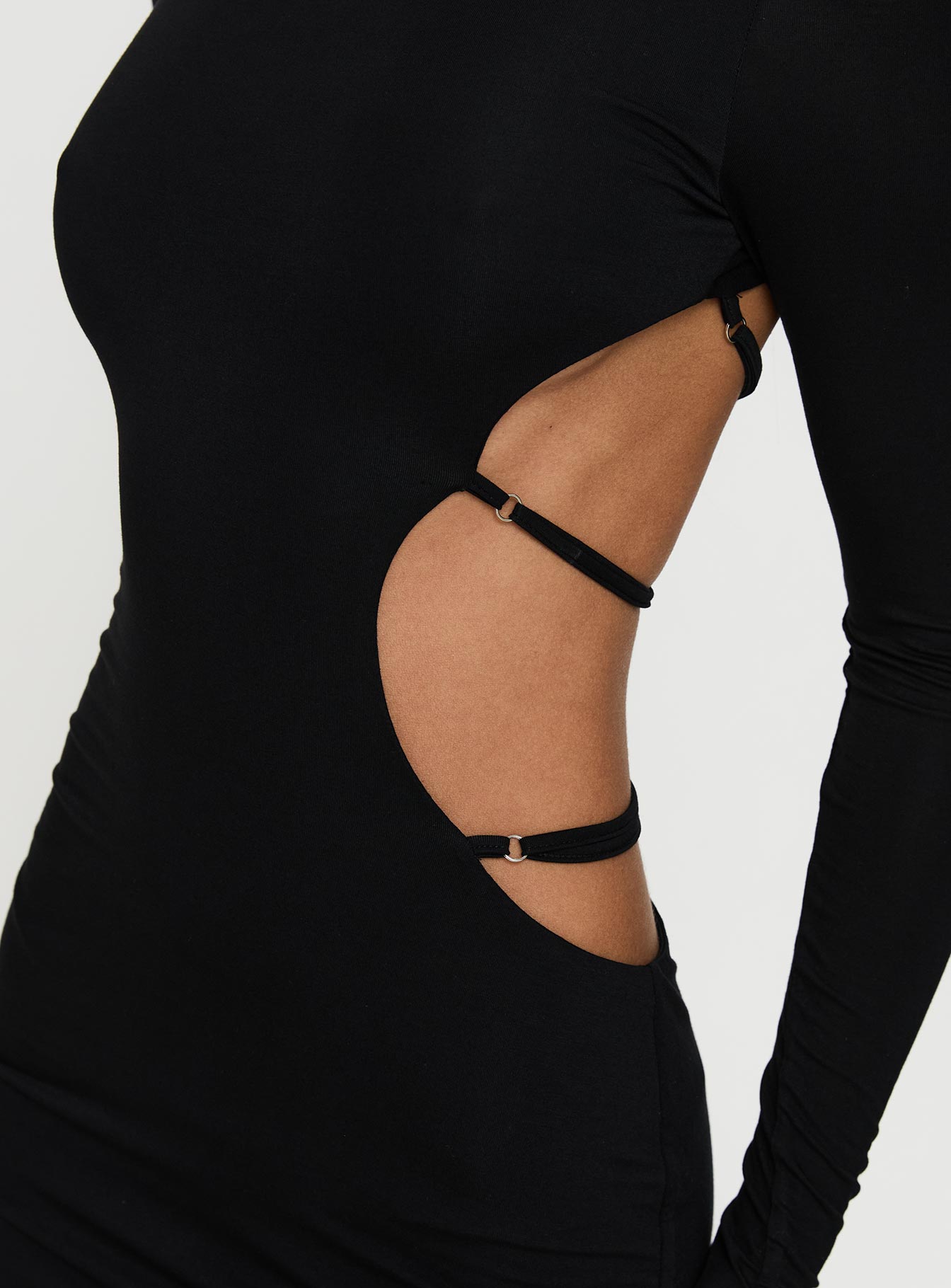 back view of model wearing Princess Polly Rowin Long Sleeve Cut Out Mini Dress Black Scoop Neck 