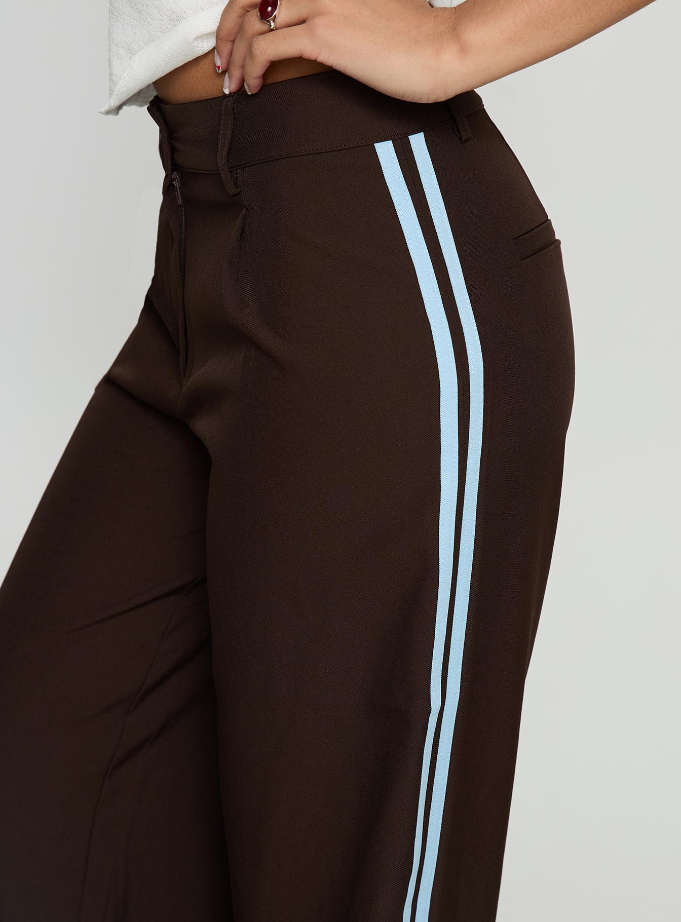 side view of model wearing Princess Polly Wendi Tipping Suit Pant Brown / Blue Mid Rise Pants 