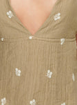 brown Halter top Floral print, v neckline, open back with tie fastening