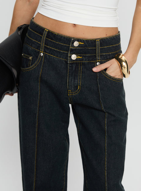 side view of model wearing Princess Polly Hannalee Low Rise Wide Leg Cargo Jeans Grunge Wash Low Rise Jeans 