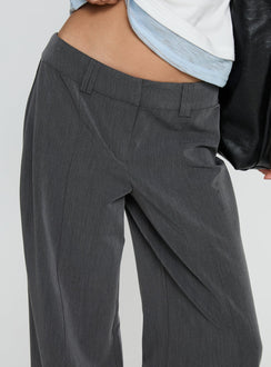 back view of model wearing Princess Polly Sarito Low Rise Straight Leg Pants Grey Mid Rise Pants 