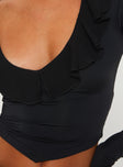 Long sleeve crop top Slim fitting, v-neckline, frill detail Good stretch, unlined