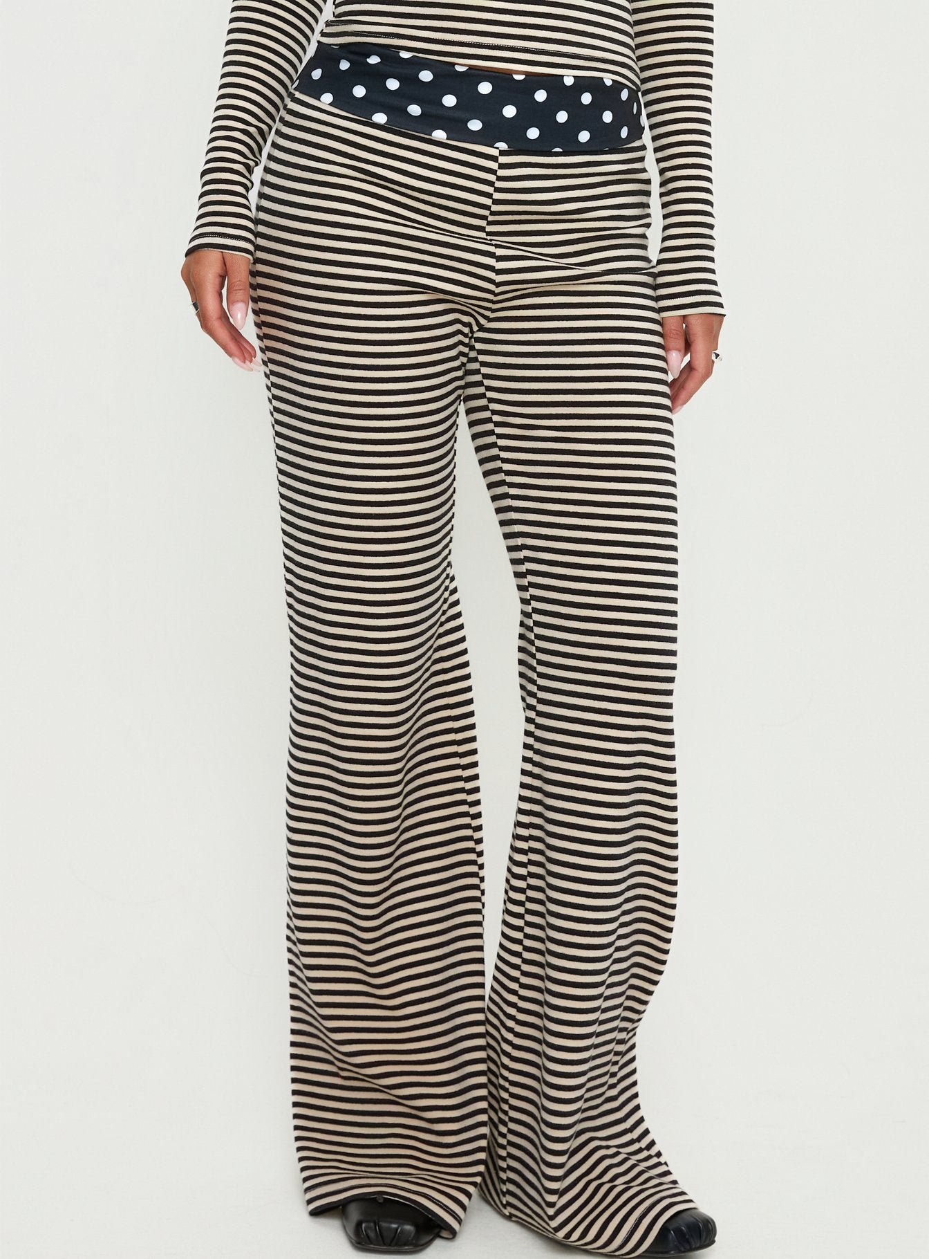 front view of model wearing Princess Polly Virenna Fold Over Pants Black Multi Mid Rise Pants 
