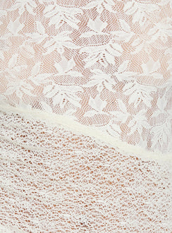 Lirienne Sheer Asymmetrical Top Cream