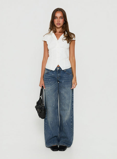 Showcasing the Ellanor Low Rise Paint Straight Leg Jean Vintage Mid Blue in womens-jeans featuring low-rise waist front view of model wearing Princess Polly