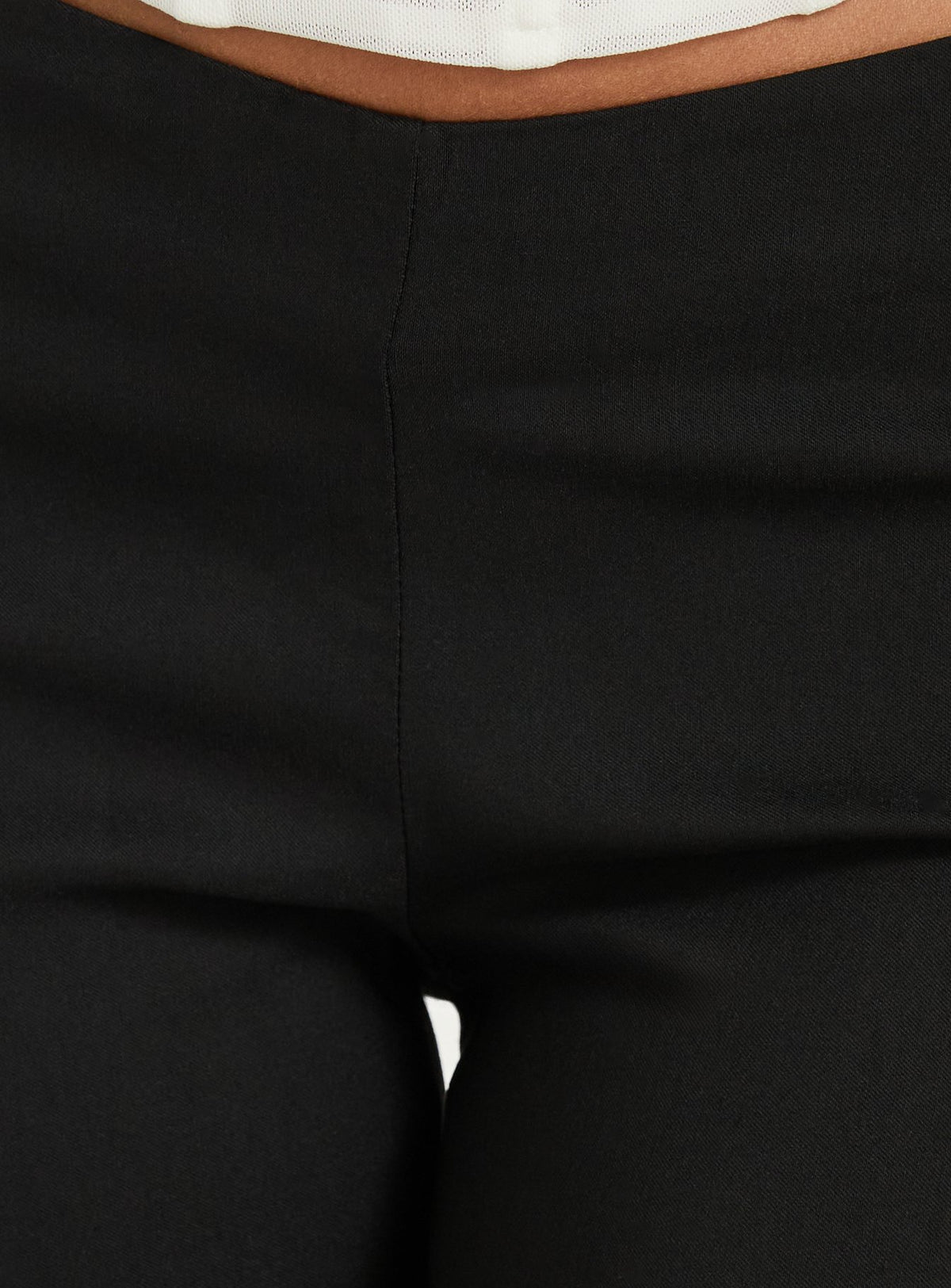 Showcasing the Zeni V Waist Bootleg Pants Black womens-regular-pants in mid-rise product view of model wearing