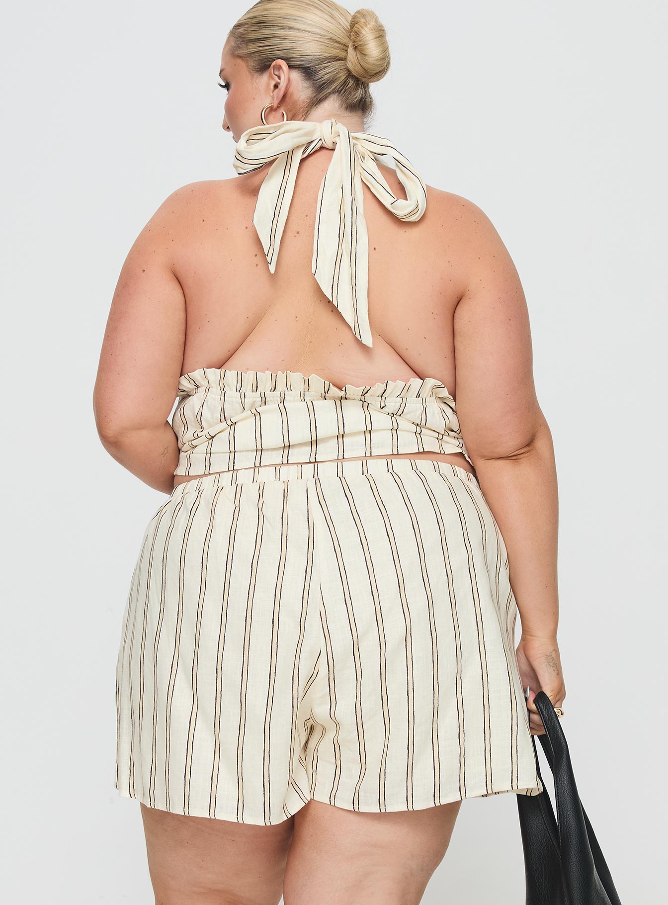 Princess Polly Curve  Striped linen set Halter neck top, tie fastening, elasticated band under bust, v-neckline High-rise shorts, elasticated waistband, twin hip pocket Non-stretch material, partially lined  Princess Polly Lower Impact