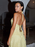 back view of model wearing Princess Polly Sun Salutations Halter Top Yellow Sleeveless Asymmetric Neckline 