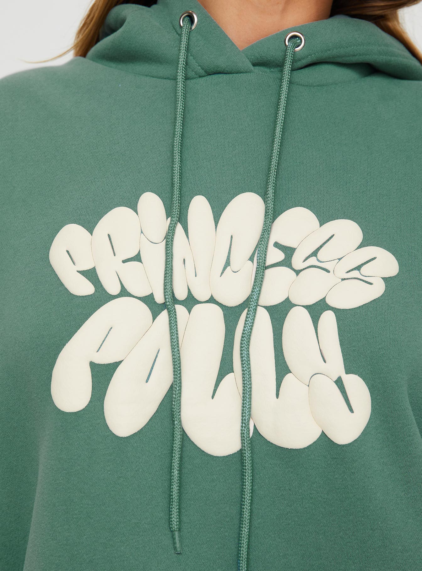 back view of model wearing Princess Polly Princess Polly Hooded Sweatshirt Bubble Text Sage / Eggshell regular 