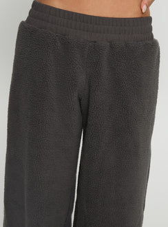 back view of model wearing Princess Polly Siberia Fleece Track Pant Charcoal Mid Rise Pants 