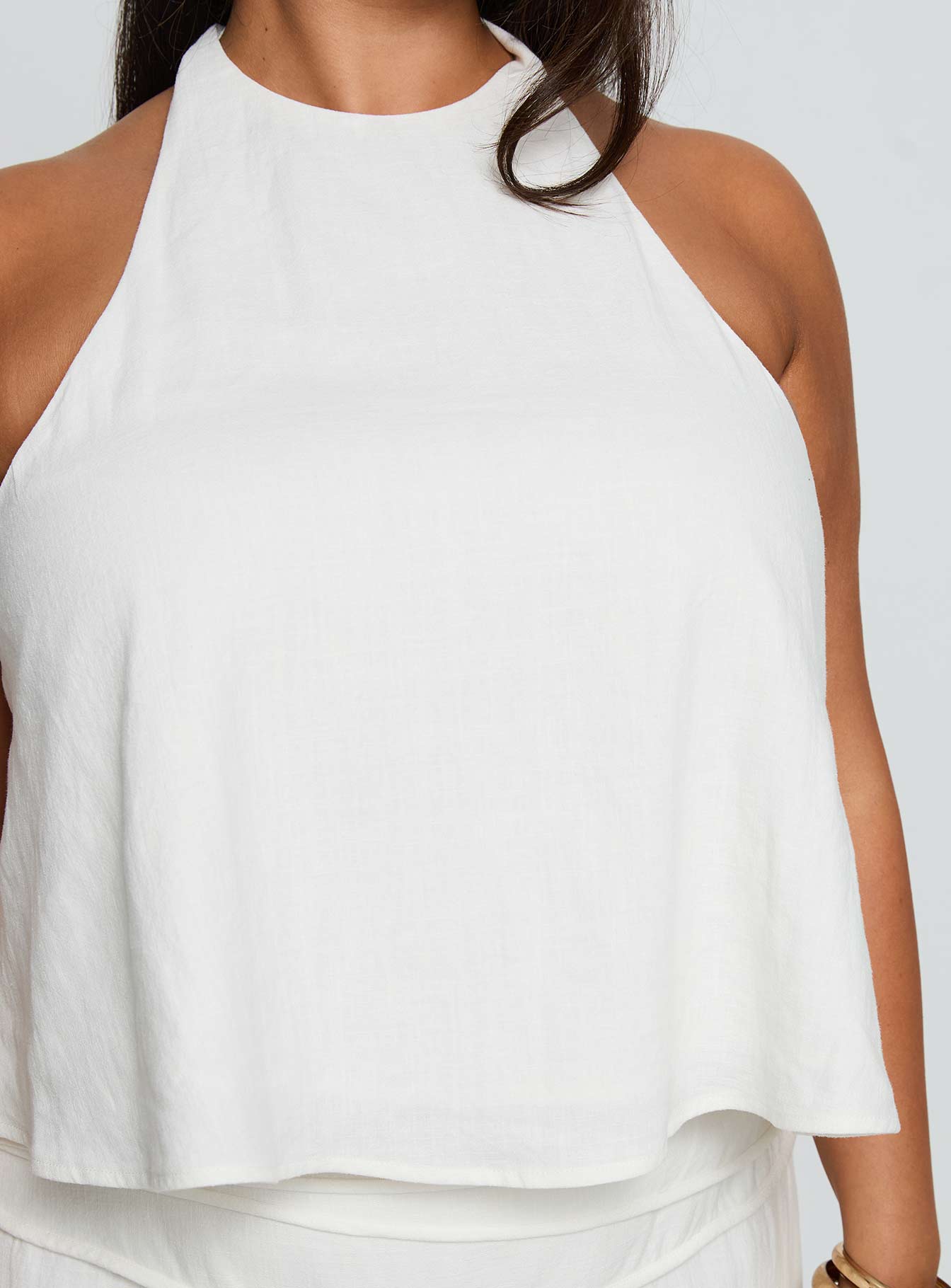 back view of model wearing Princess Polly Aquaria Halter Linen Blend Top White Curve Sleeveless Crew Neck 