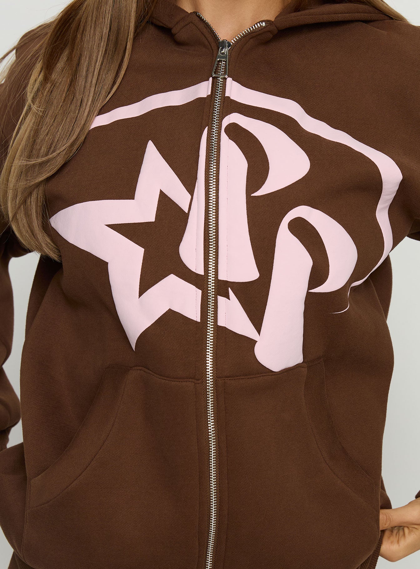 back view of model wearing Princess Polly Princess Polly Stargirl Zip Through Jumper Brown Longline Jumpers 