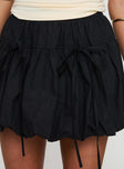 back view of model wearing Princess Polly Vannes Bubble Hem Mini Skirt Black Mini Skirts 