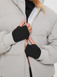 Ribbed puffer jacket High neckline, twin hip pockets, zip fastening down front, drawstring waist, elasticated cuffs