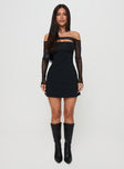 side view of model wearing Princess Polly Kampton Strapless Mini Dress Black Asymmetric Neckline 