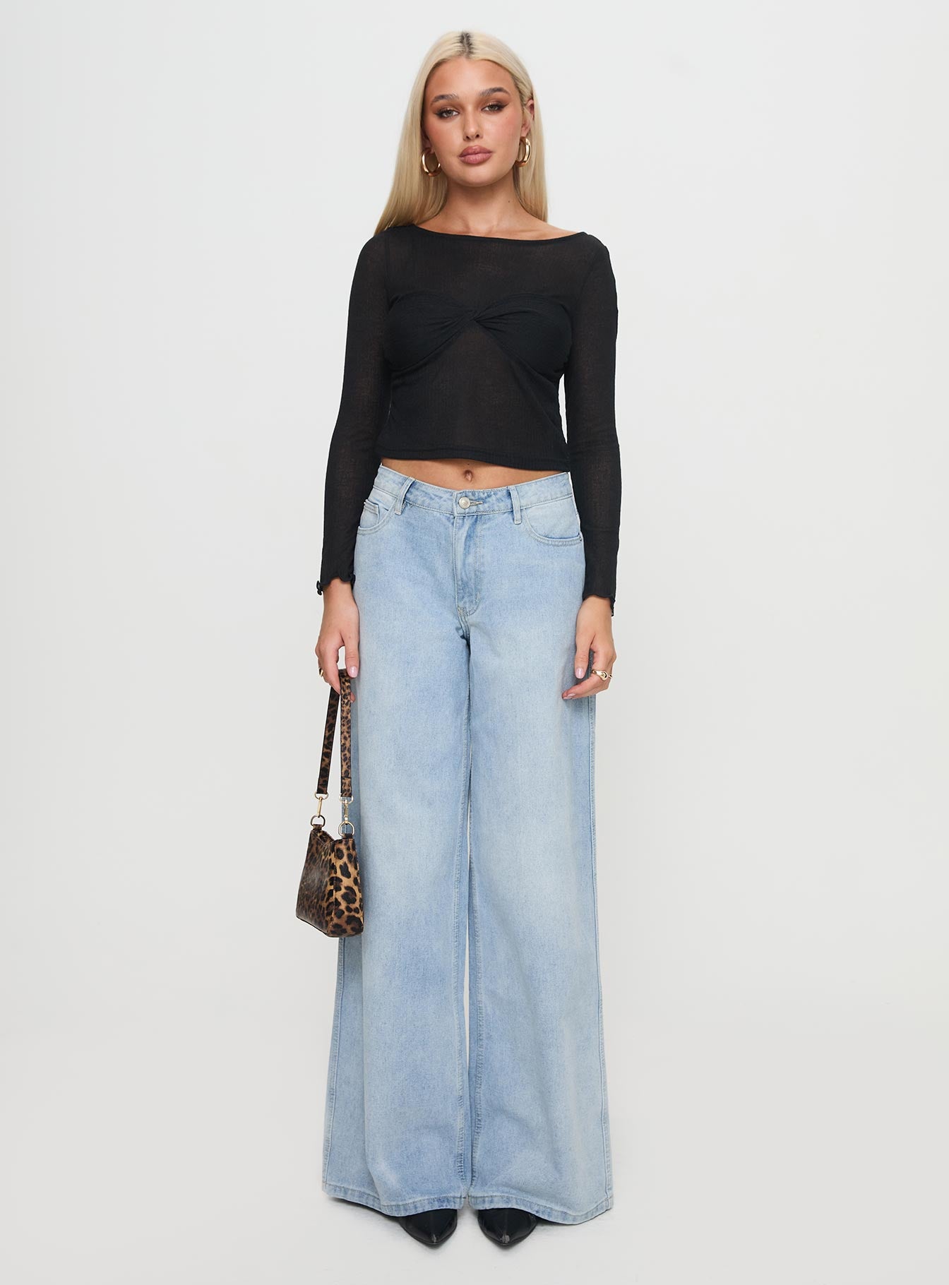 front view of model wearing Princess Polly November Long Sleeve Top Black Full Sleeves Boat Neck 