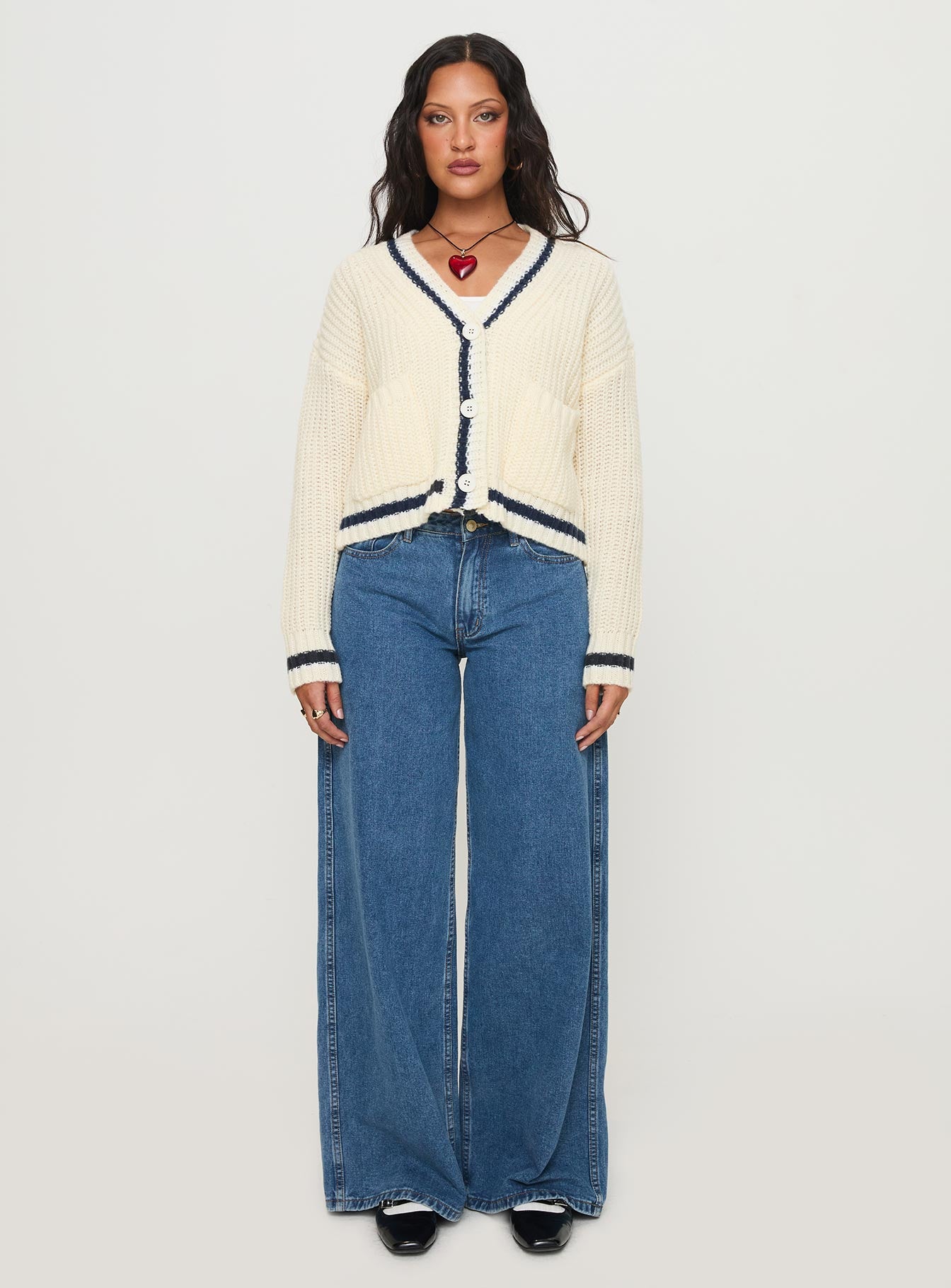 side view of model wearing Princess Polly Tavian Knit Cardigan Navy / Cream 