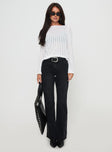 side view of model wearing Princess Polly Kemsley Mid Rise Bootleg Jeans Washed Black Mid Rise 