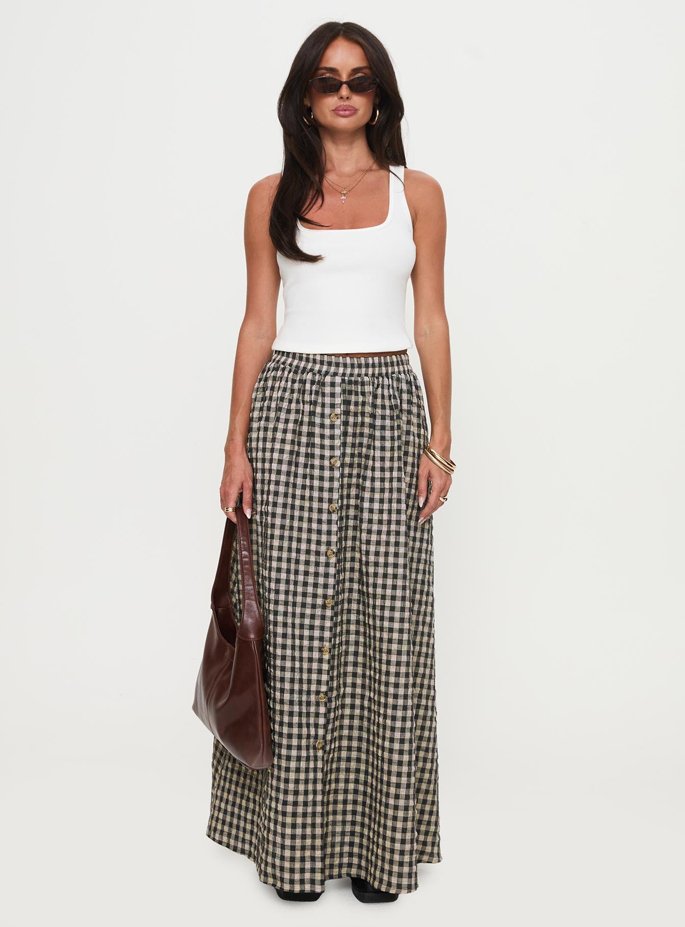   side view of model wearing Princess Polly Cartmel Check Maxi Skirt Black / Cream Maxi 