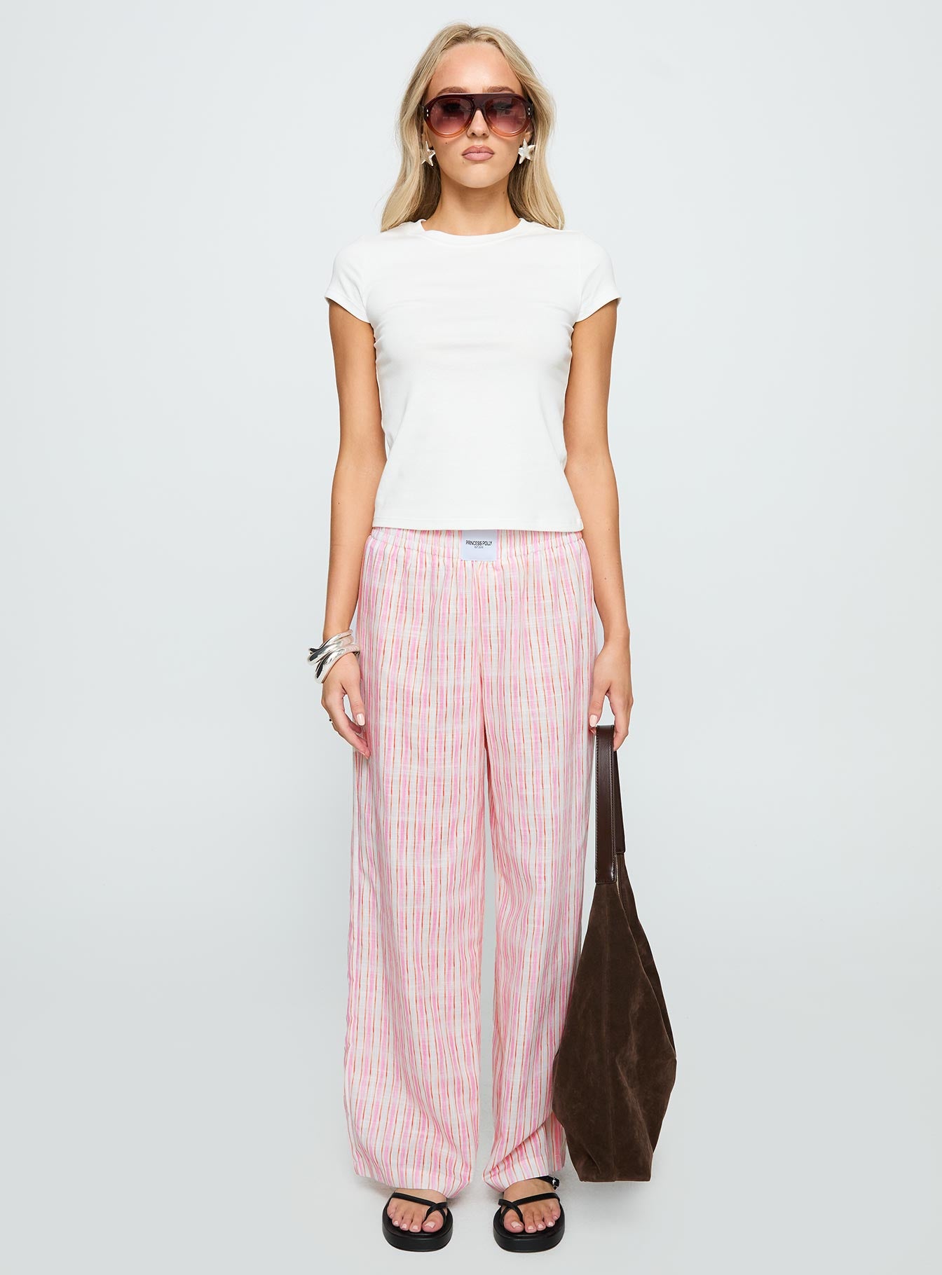front view of model wearing Princess Polly Beach House Pants Pink Stripe High Waisted Pants 