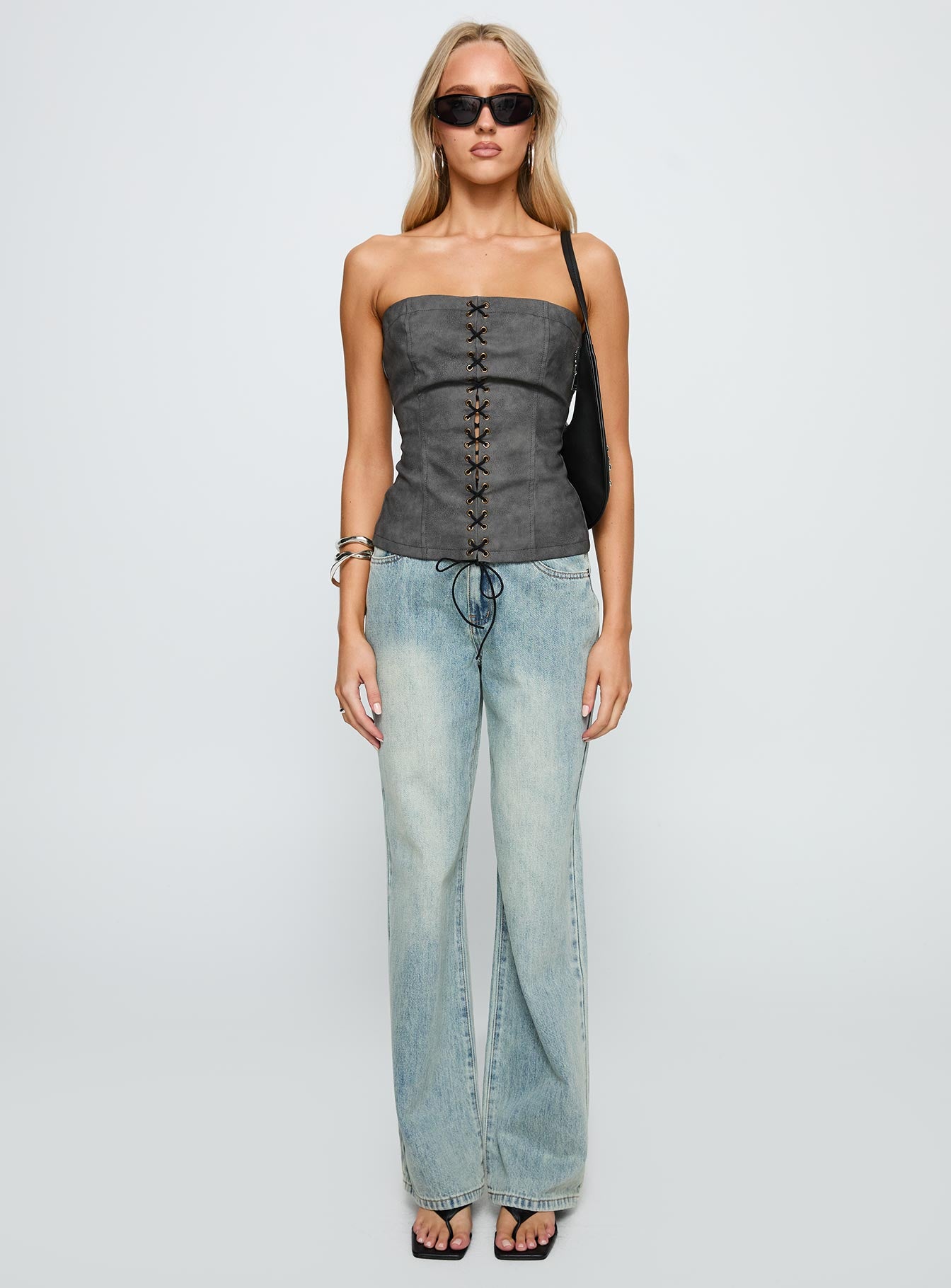 front view of model wearing Princess Polly Soft Spoken Strapless Tie Up Top Black Sleeveless straight 