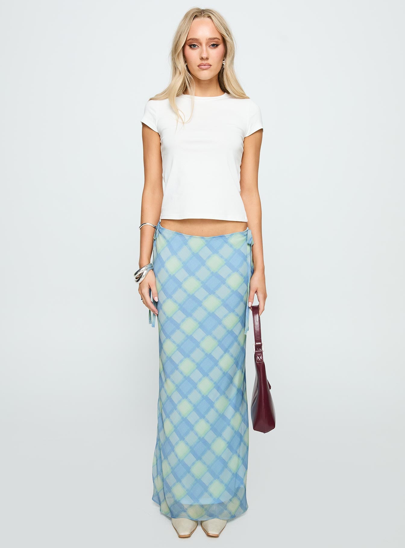   front view of model wearing Princess Polly Seafarer Tie Side Maxi Skirt Blue Check Maxi 