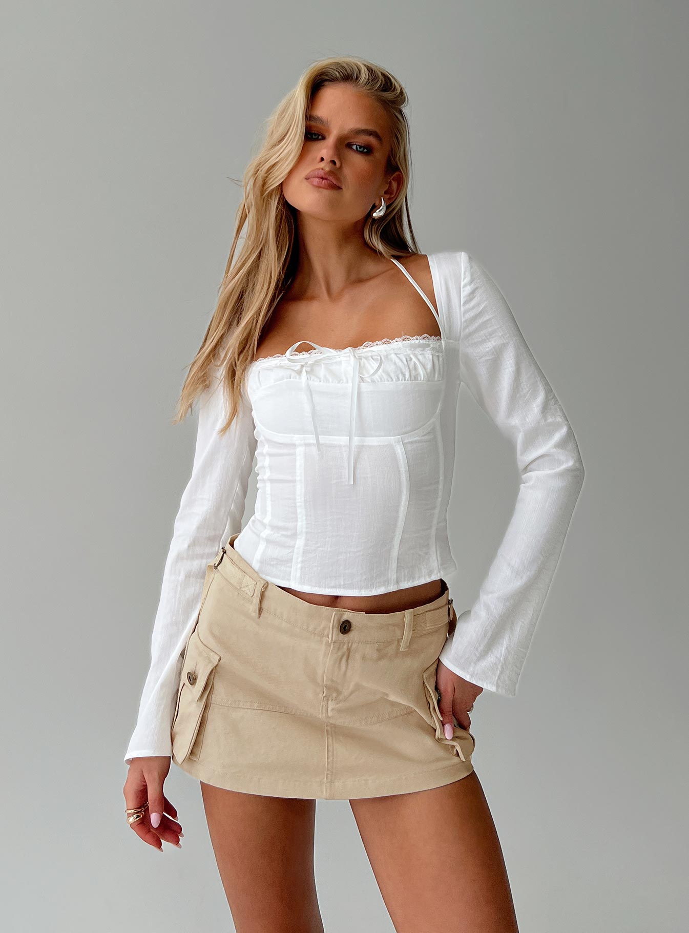 front view of model wearing Princess Polly Talgada Long Sleeve Top White Full Sleeves Square Neck 