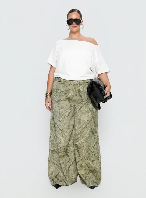 front view of model wearing Princess Polly Mckinley Mid Rise Wide Leg Jeans Camouflage Curve Mid Rise Jeans 