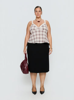   side view of model wearing Princess Polly Baseline Rib Midi Skirt Black Curve Midi Skirts 