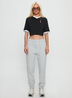 back view of model wearing Princess Polly Ohio State Basic Sweatpants Grey Mid Rise Pants 