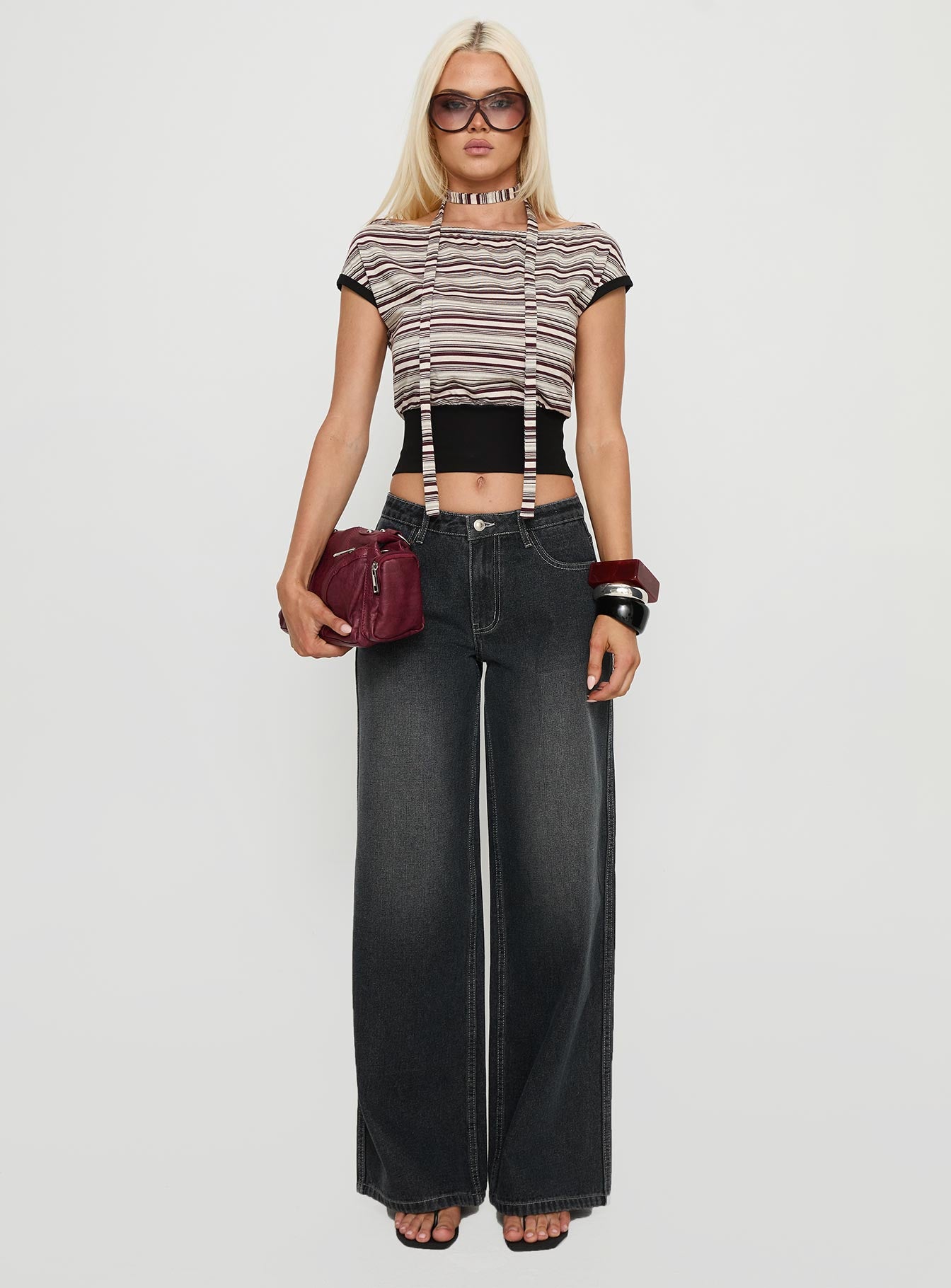 front view of model wearing Princess Polly Ramos Low Rise Wide Leg Jeans Dark Grey Wash Low Rise Jeans 