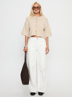 side view of model wearing Princess Polly Verina Short Sleeve Knit Cardigan Oat cropped 