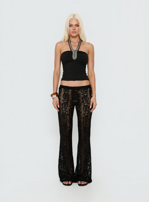 side view of model wearing Princess Polly Rosadonna Lace Flare Pants Black Low Rise Pants 
