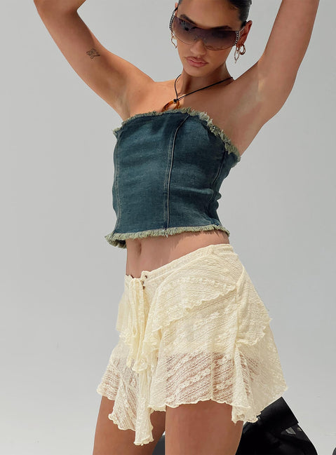 Front view of model wearing  front Princess Polly Sleeveless High Neck  Omas Bandeau Top Blue Acid Wash