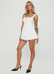 Romper Corset style, fixed straps, drawstring tie at bust, invisible zip fastening Non-stretch material, fully lined 