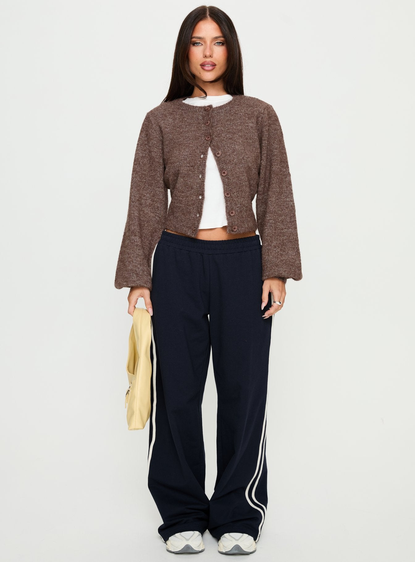 side view of model wearing Princess Polly Dawsen Button Down Cardigan Brown cropped 