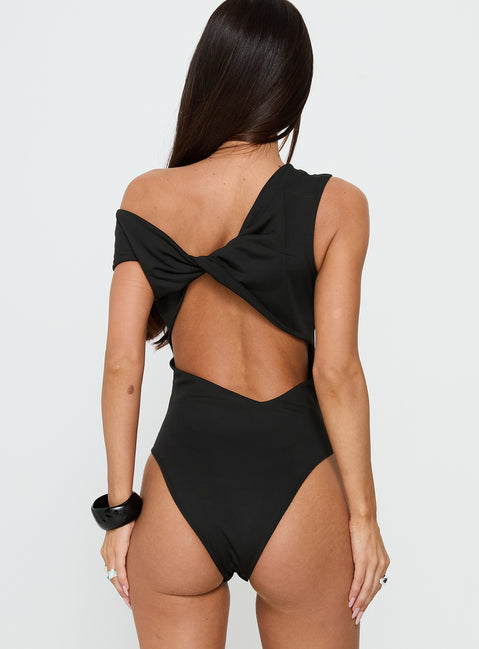 back view of model wearing Princess Polly Back To Back Off Shoulder Twist Back Bodysuit Black Short Sleeve 