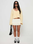 front view of model wearing Princess Polly Artha Cardigan Lemon Cropped 