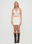   front view of model wearing Princess Polly Lumache Lace Mini Skirt Cream Mini Skirts 