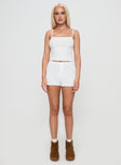 side view of model wearing Princess Polly Halia Pointelle Short White High Waisted Shorts 