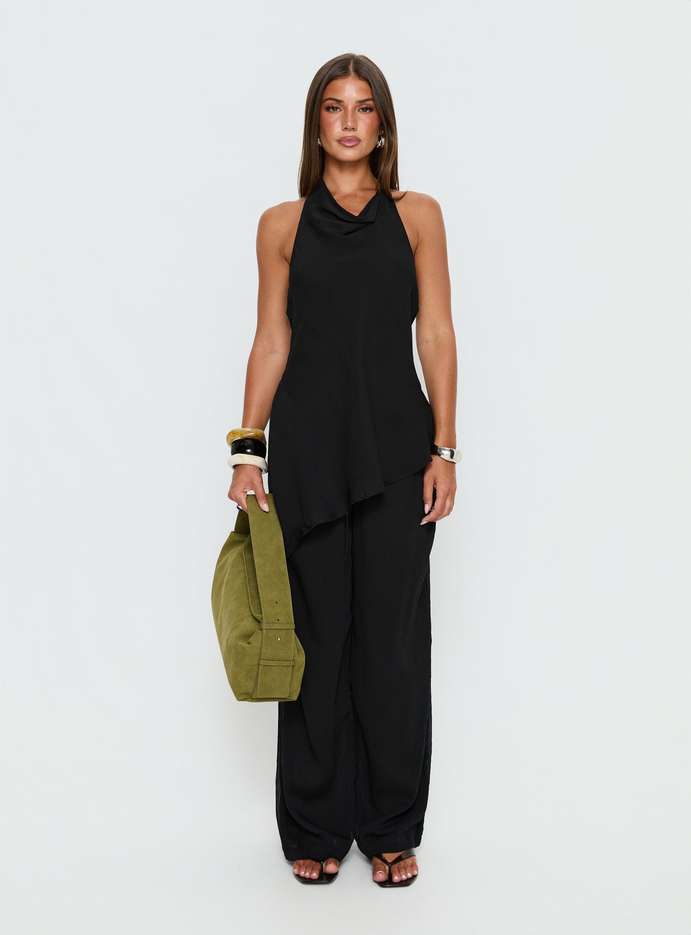 side view of model wearing Princess Polly Emorisa Mid Rise Chiffon Pant Black Mid Rise Pants 