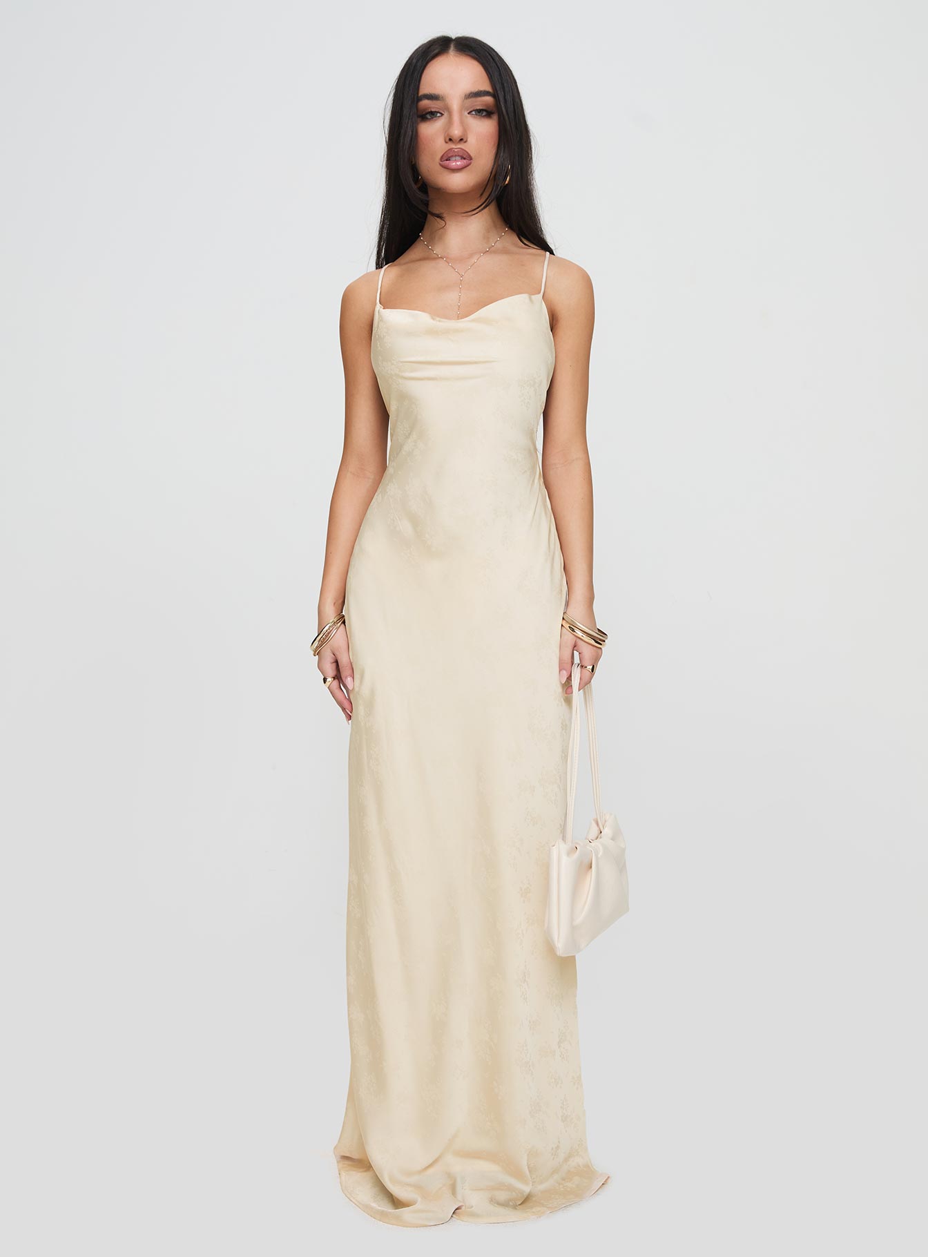 side view of model wearing Princess Polly Esti Maxi Dress Champagne Cowl Neck 