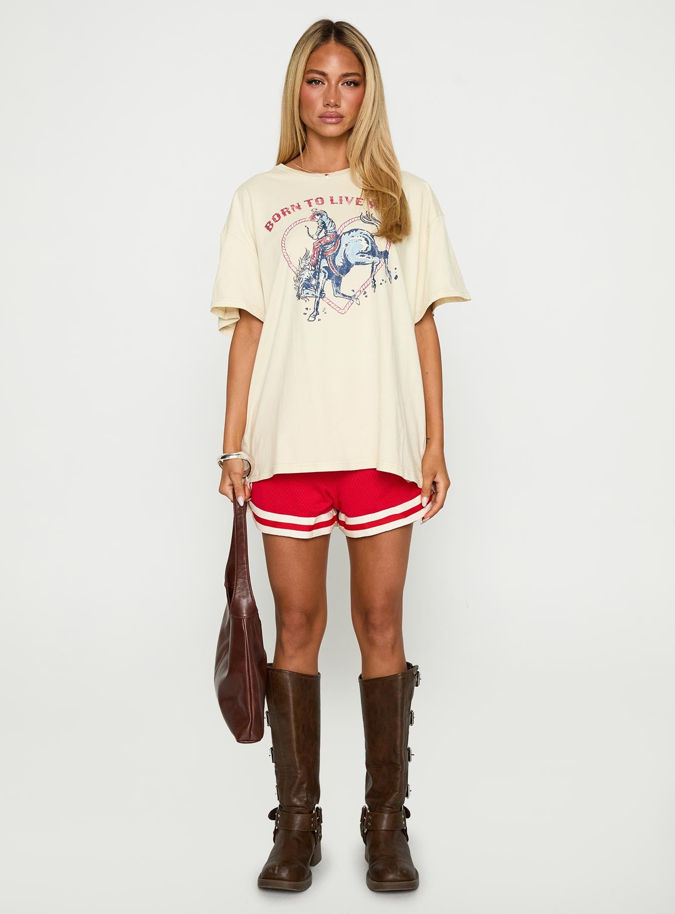 back view of model wearing Princess Polly Born To Live Wild Graphic Top White Half Sleeves Crew Neck 