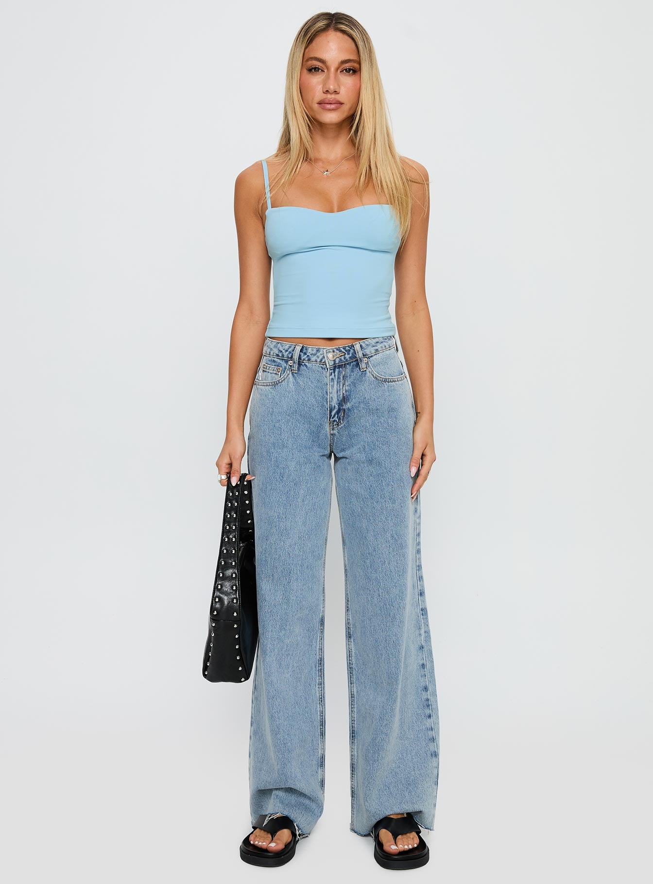 back view of model wearing Princess Polly Evanda Top Light Blue Sleeveless Sweetheart 