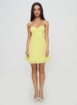 side view of model wearing Princess Polly Stolen Kisses Mini Dress Lemon Sweetheart Neckline 