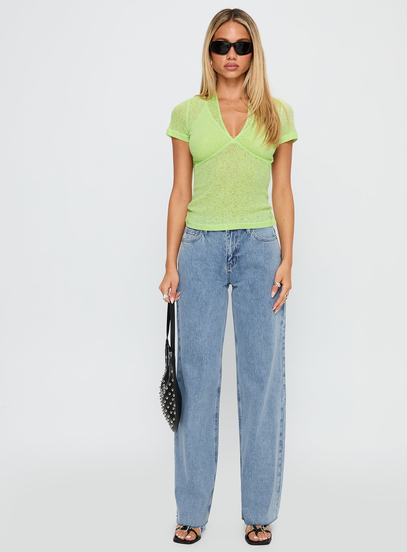 front view of model wearing Princess Polly Darla Low Rise Straight Jean Vintage Blue Wash Low Rise Jeans 