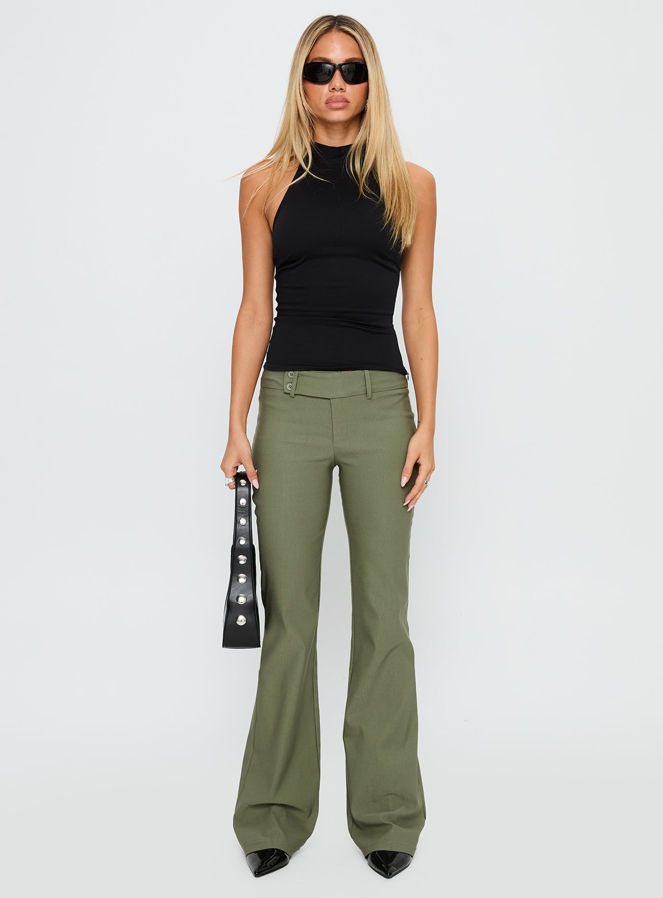 front view of model wearing Princess Polly Kinkirk Flared Pants Olive Green Low Rise Pants 